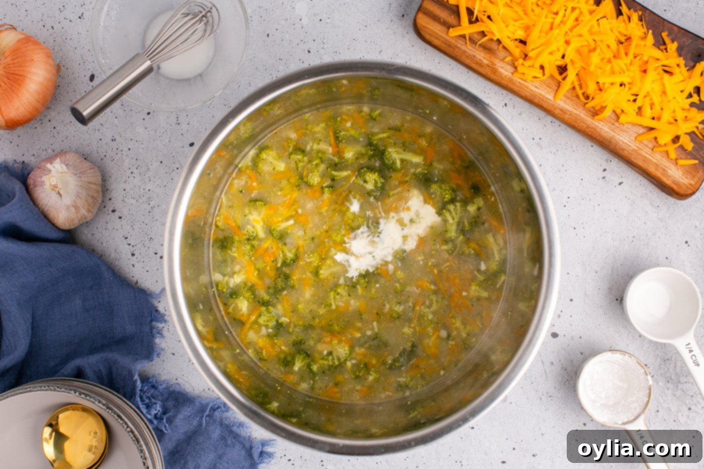 adding cornstarch slurry to broccoli cheddar soup to thicken