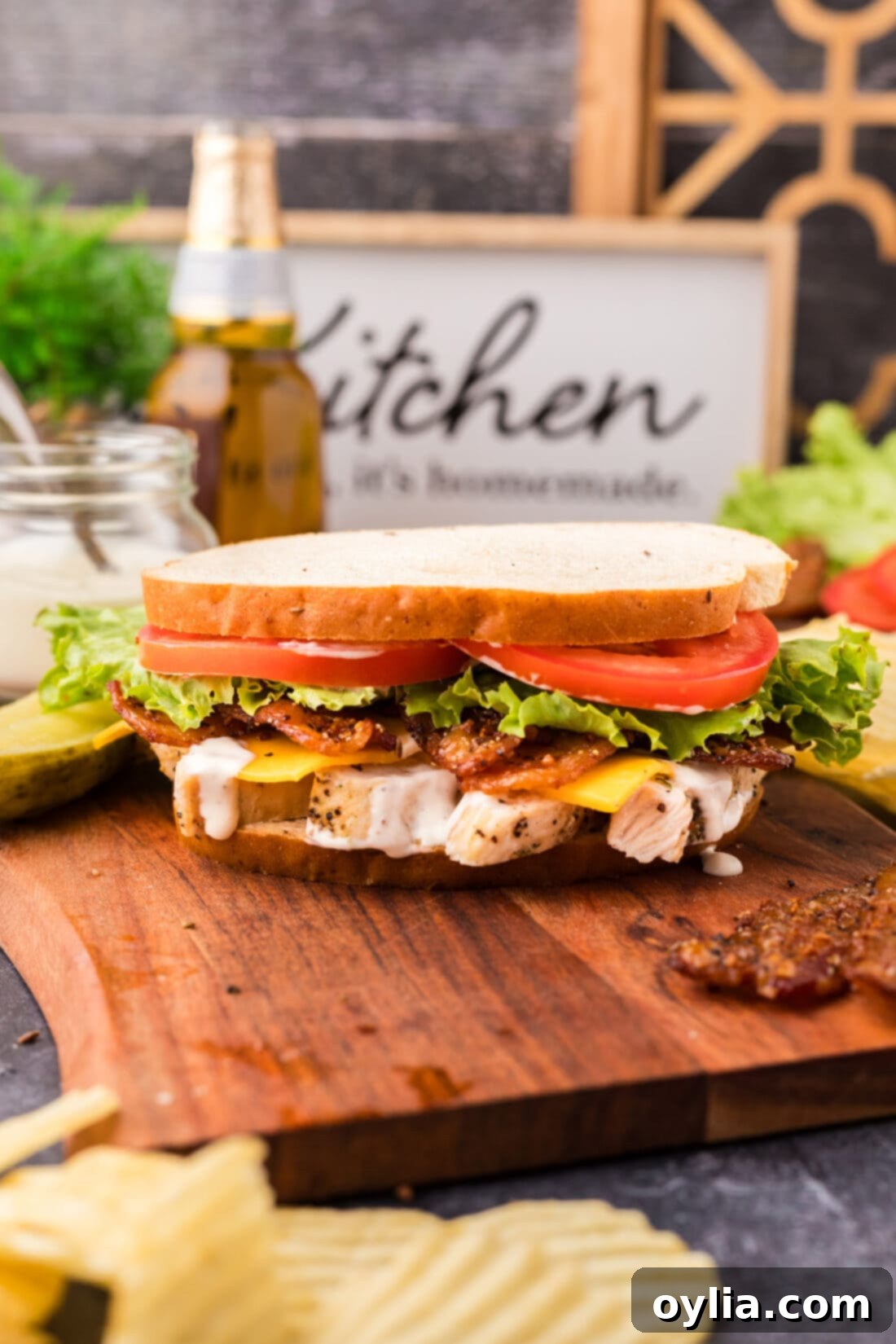 Chicken Bacon Ranch Sandwich on a wooden serving tray