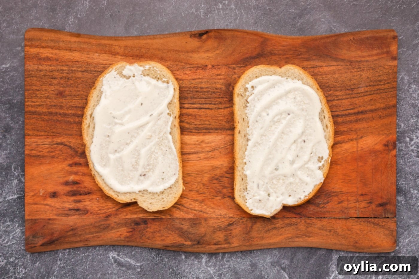 ranch dressing spread on rye bread slices