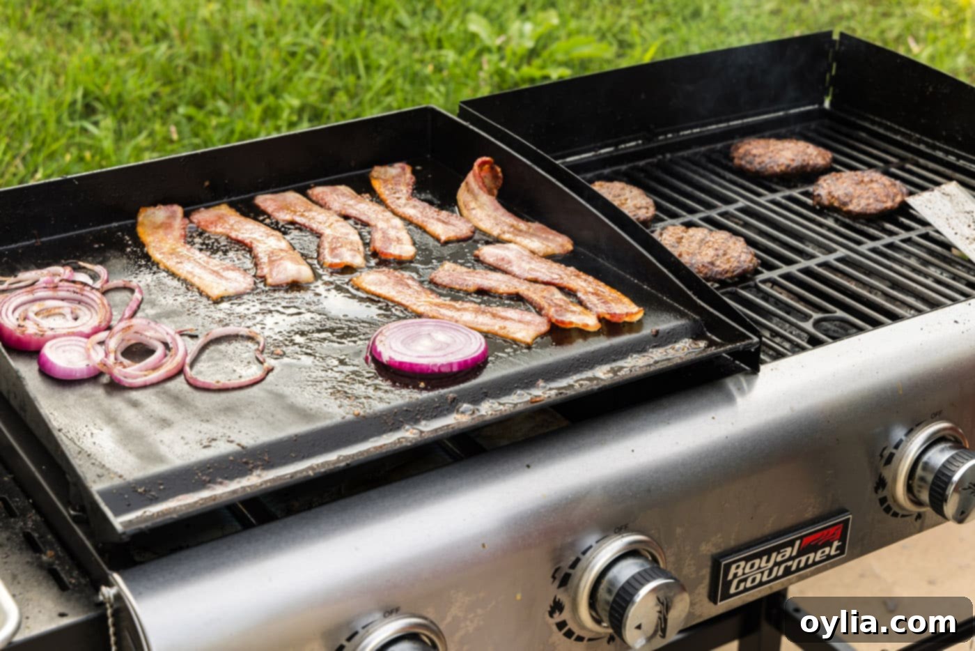 bacon and onion cooking on flat top grill