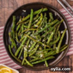 Air Fryer Green Beans on a black plate