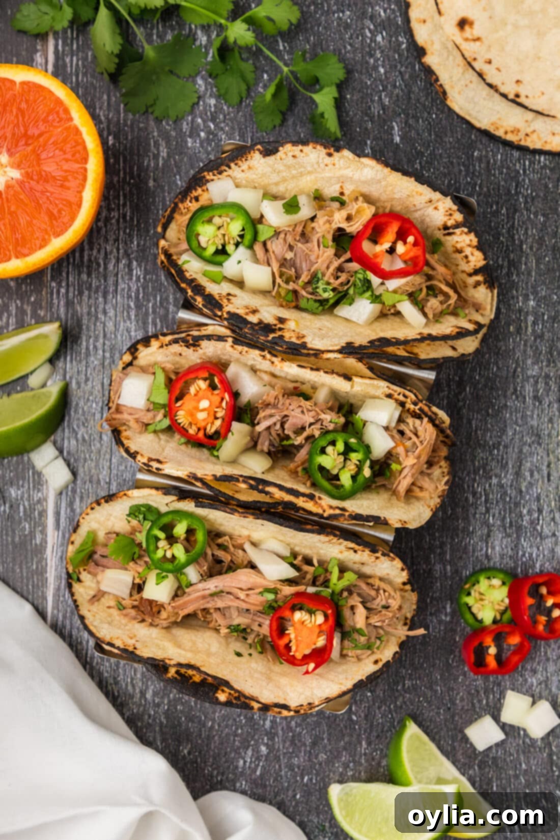 Three tortillas filled with Carnitas