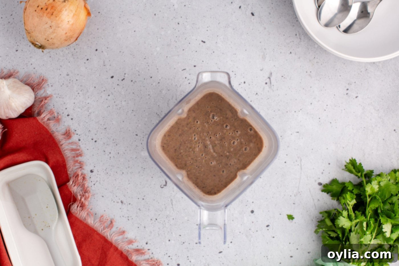 Pureed black bean soup in a blender, smooth and creamy.