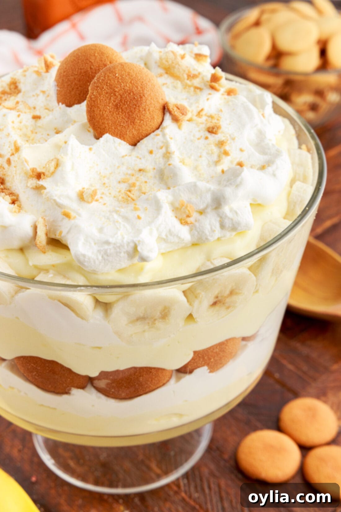 Banana Dream Trifle 2 Close up photo of a Banana Trifle showing distinct layers of pudding, cream, and bananas with Nilla wafers
