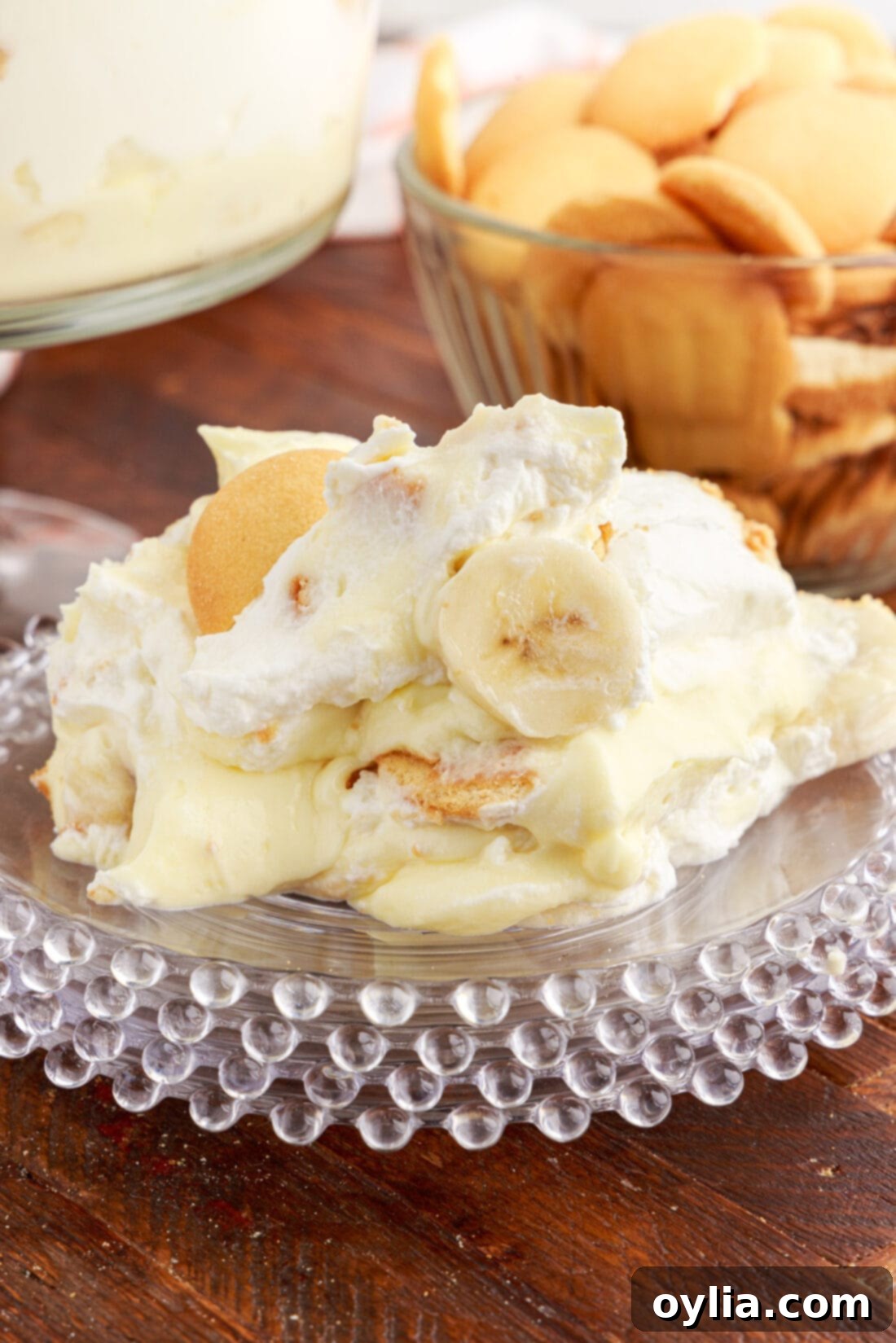 Banana Dream Trifle 16 A slice of Banana Trifle on a white plate, showing all the layers