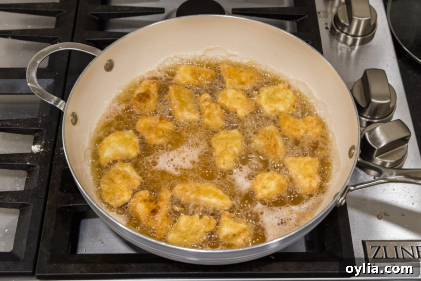 frying cubed chicken in oil