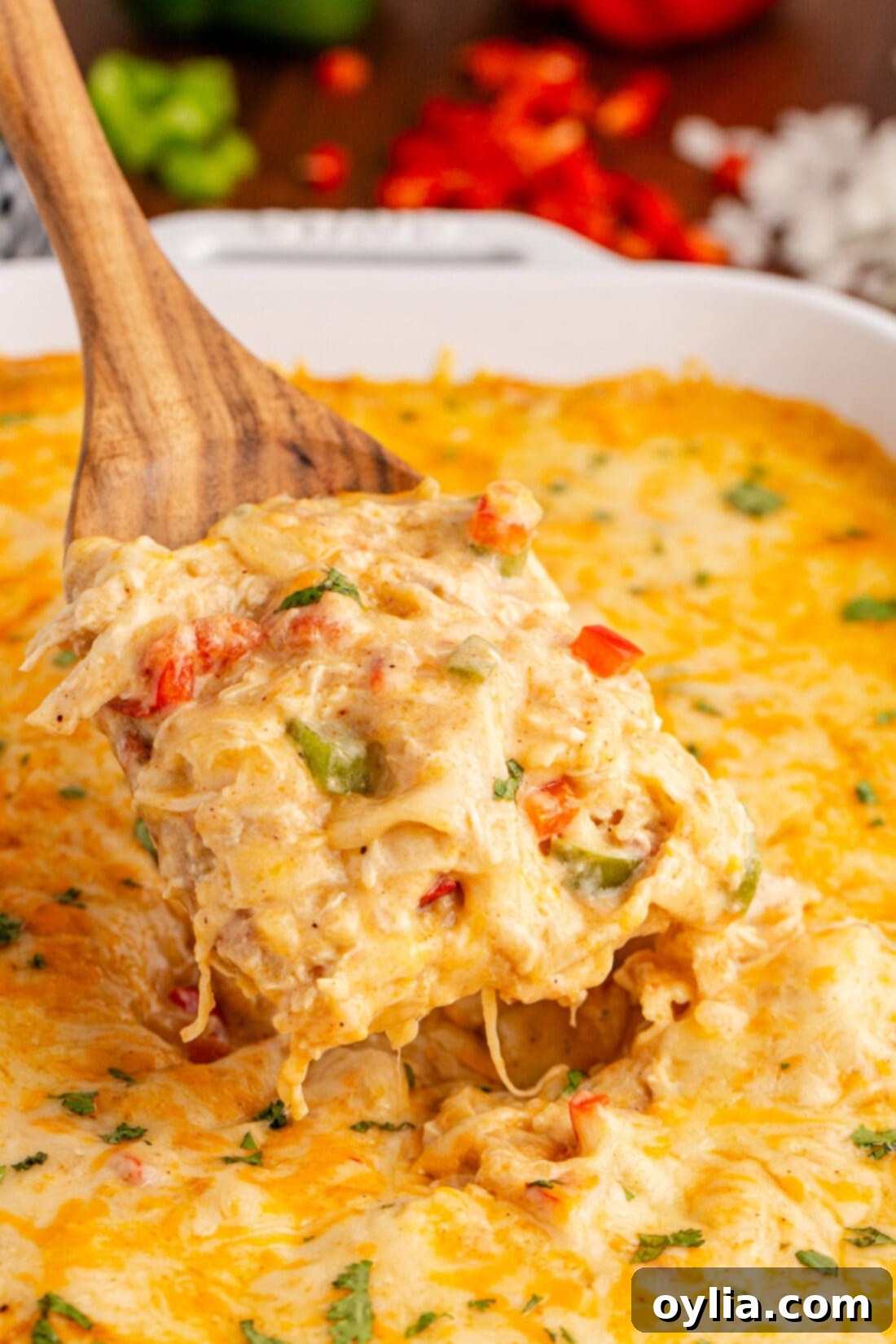 King Ranch Chicken Casserole being lifted out of the pan by a spatula 