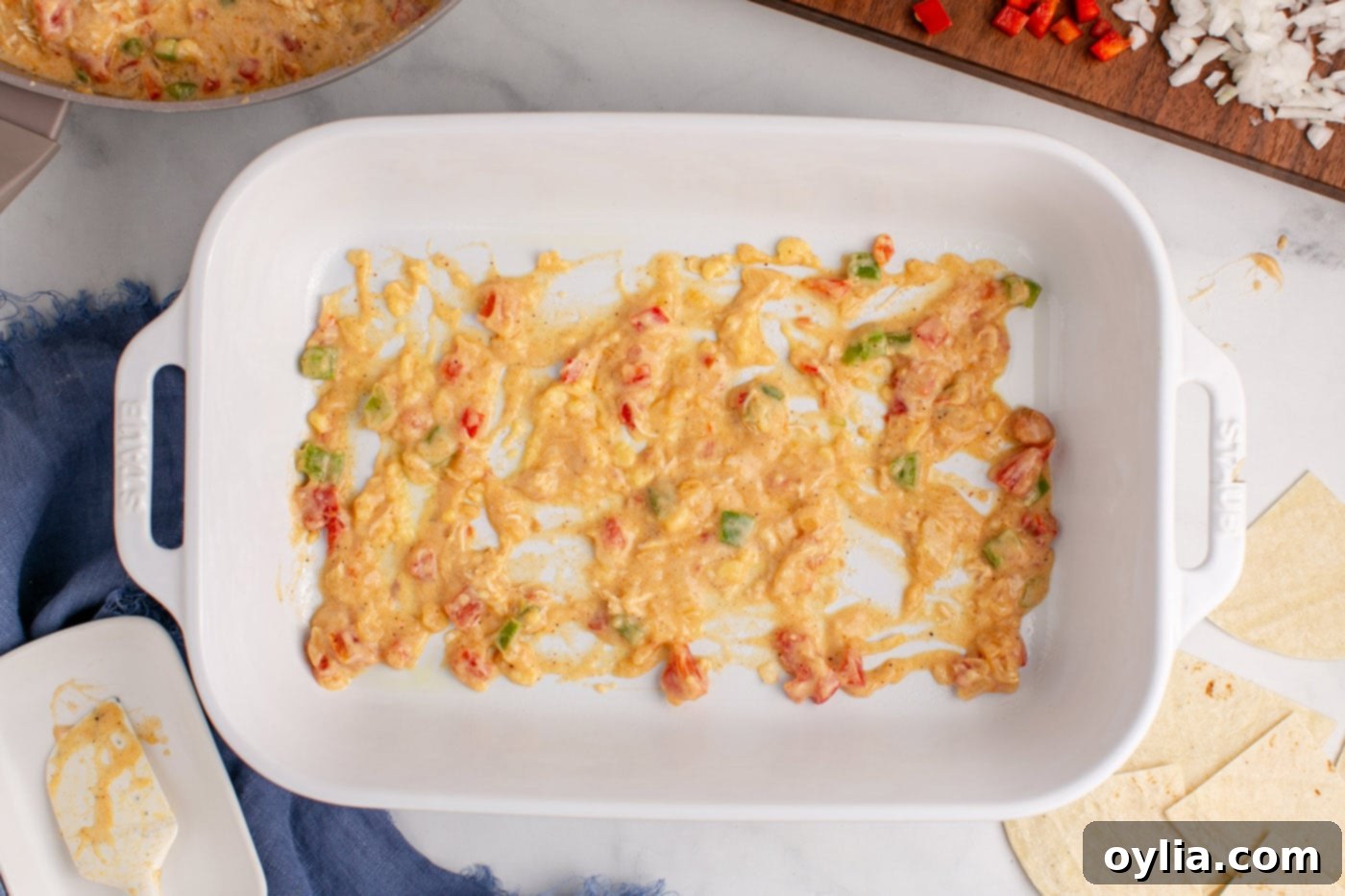 layer of sauce mixture on the bottom of a baking dish