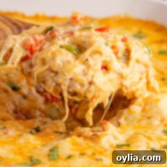 Close up photo of a spatula of King Ranch Chicken Casserole