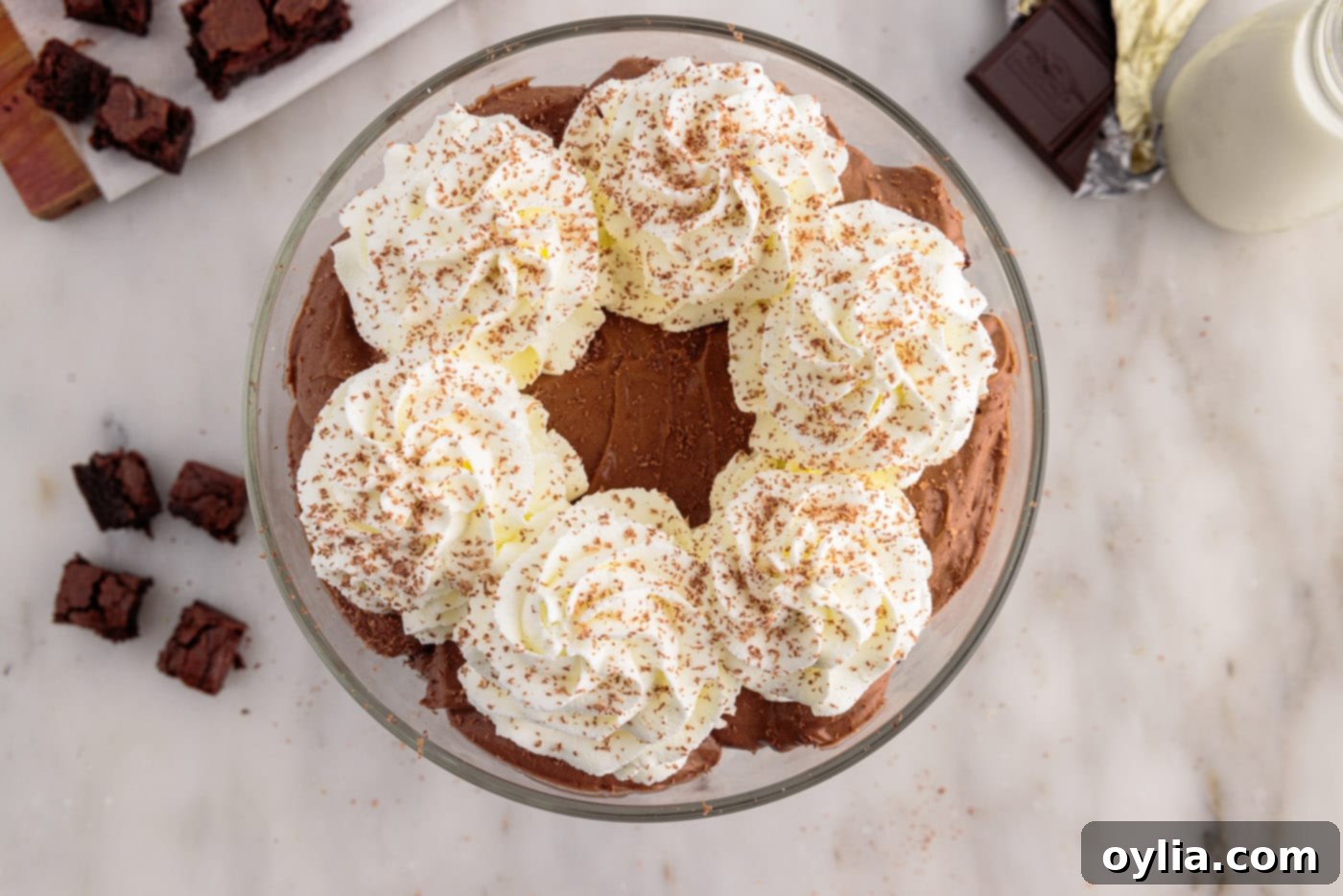 brownie trifle with piped whipped cream and chocolate shavings