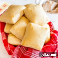 Texas Roadhouse Rolls in a basket, warm and ready to serve