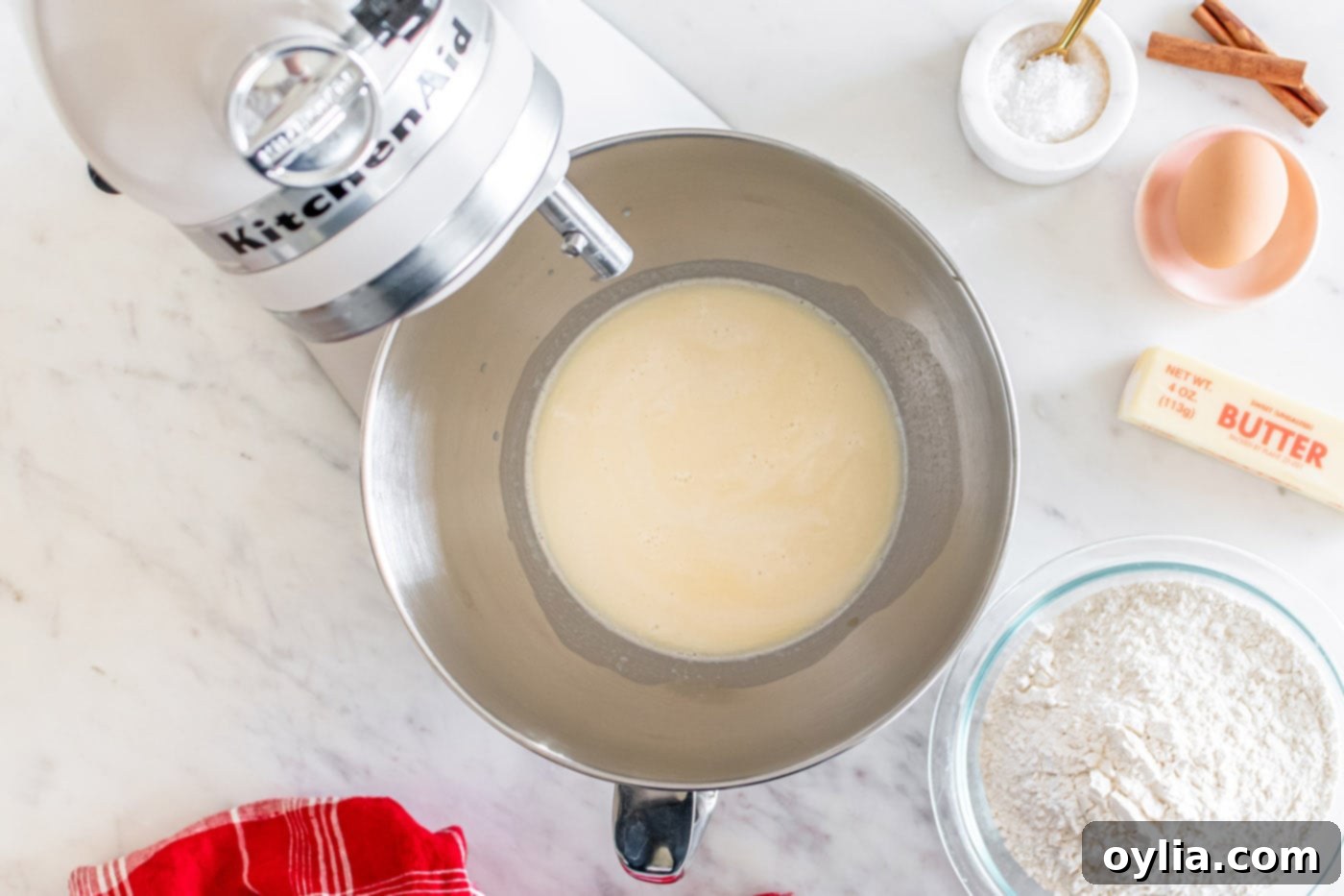 active yeast with milk and initial flour in a stand mixer bowl