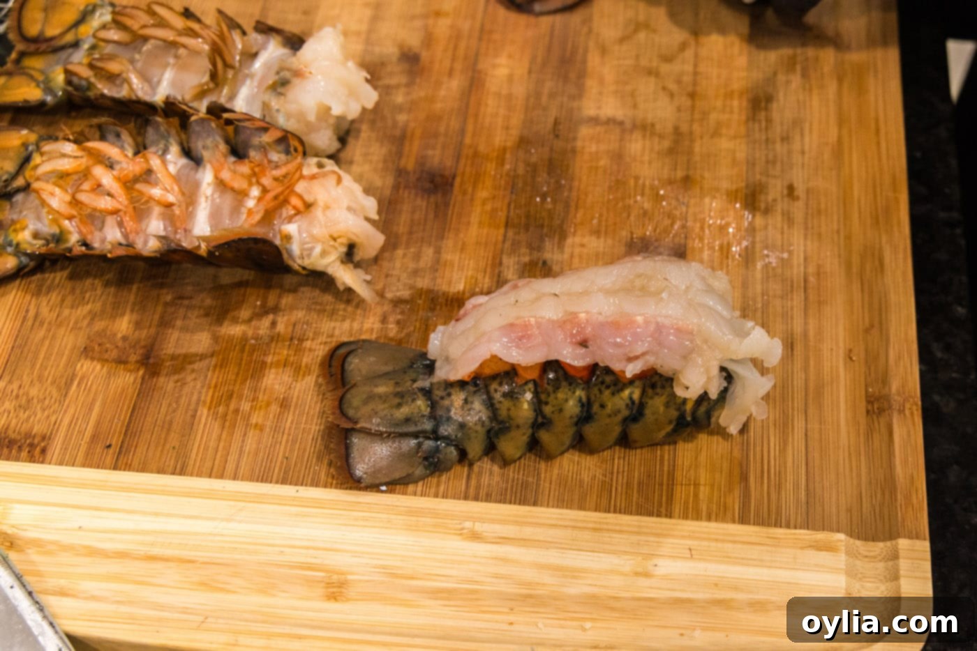crowned lobster on a cutting board