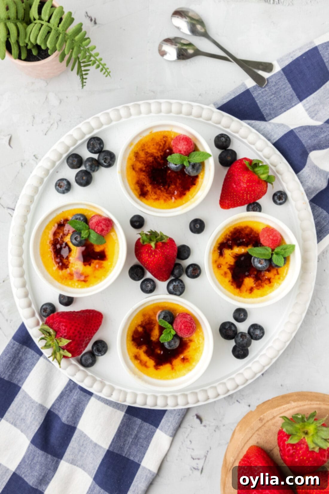 Creme Brulee on a platter with assorted fruit