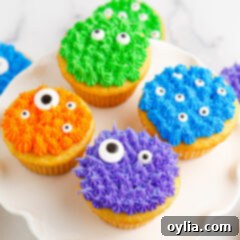 Close up photo of Monster Cupcakes on a cake stand