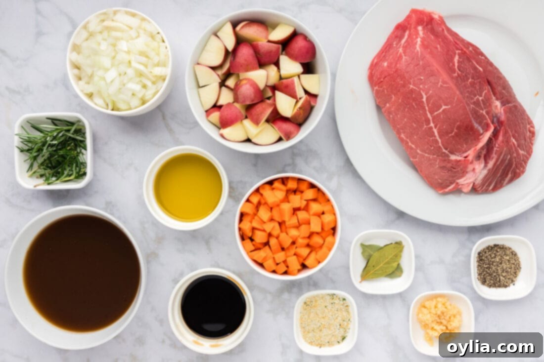 A collection of fresh ingredients laid out, including a sirloin tip roast, olive oil, garlic salt, black pepper, minced garlic, chopped onion, rosemary sprigs, soy sauce, beef broth, baby red potatoes, chopped carrots, and bay leaves, ready for Instant Pot Roast Beef preparation.