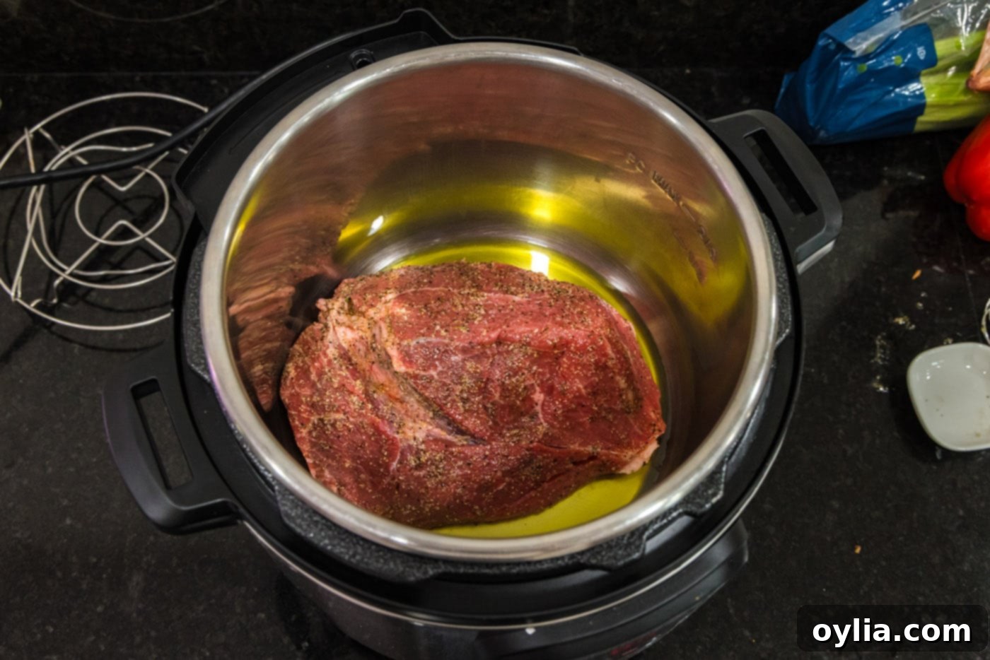 The sirloin tip roast browning in the Instant Pot, developing a rich, caramelized crust on its surface.