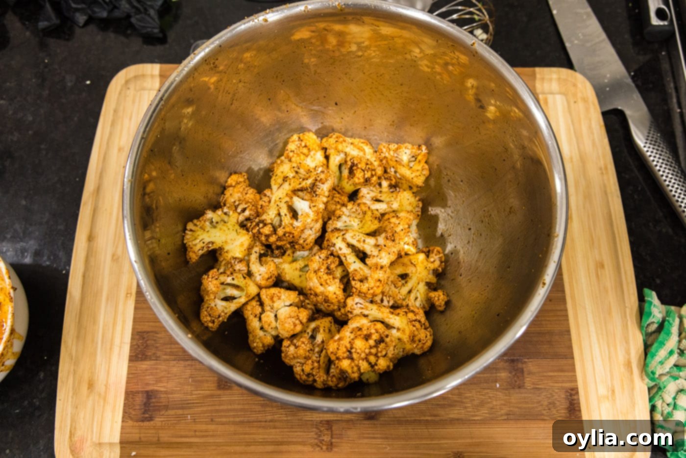 seasoned cauliflower florets in a bowl