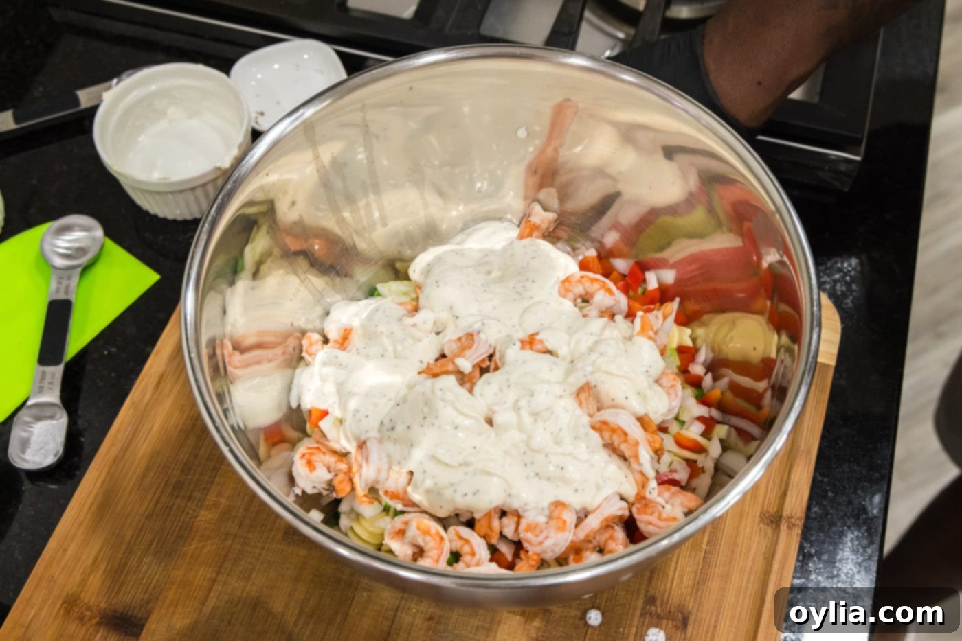 shrimp salad dressing added to pasta, vegetables, and cooked shrimp