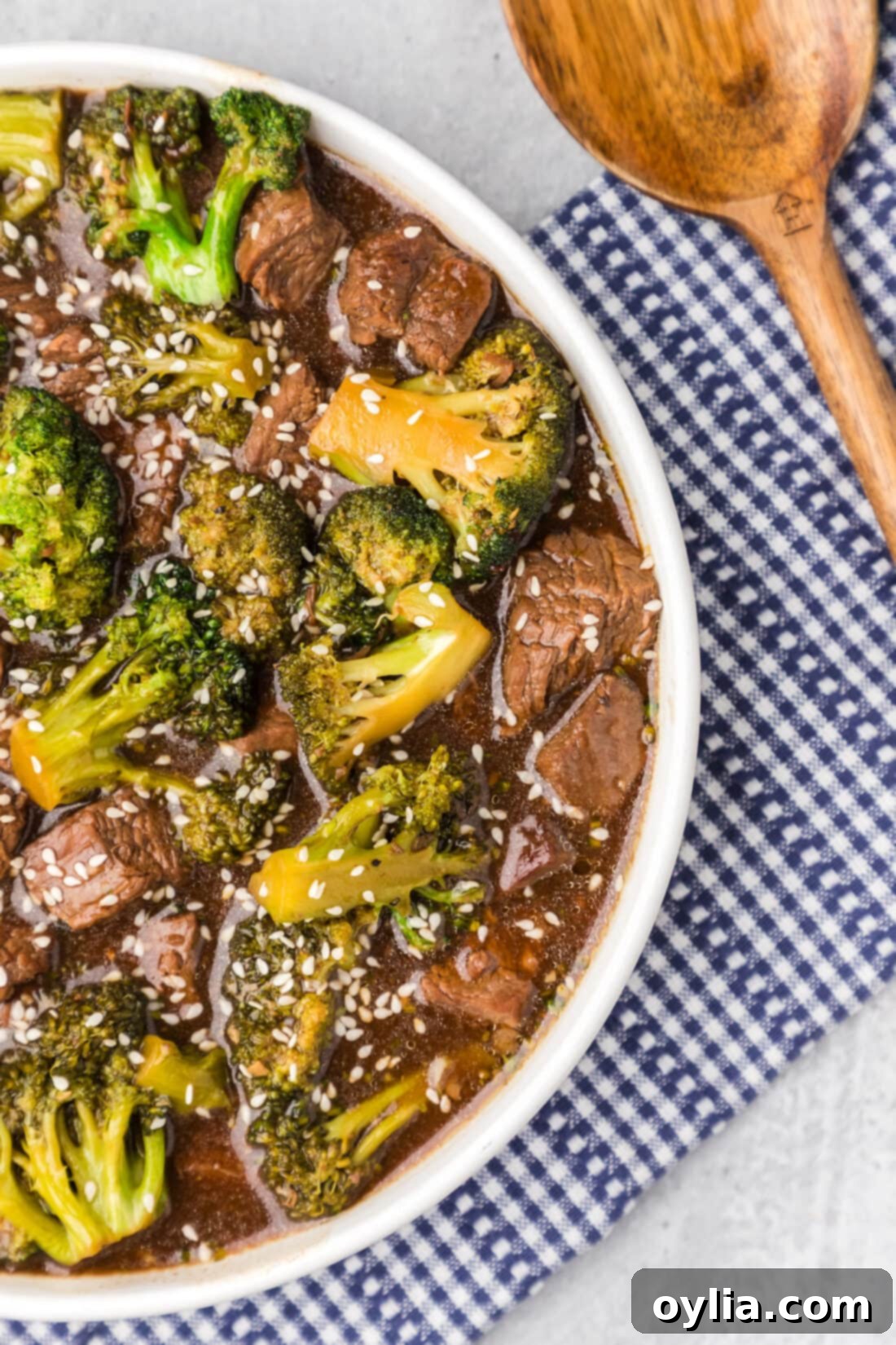 A bowl of freshly made Instant Pot Beef and Broccoli, showcasing tender beef, vibrant green broccoli, and a glistening savory sauce. Perfect for a quick, healthy weeknight dinner.