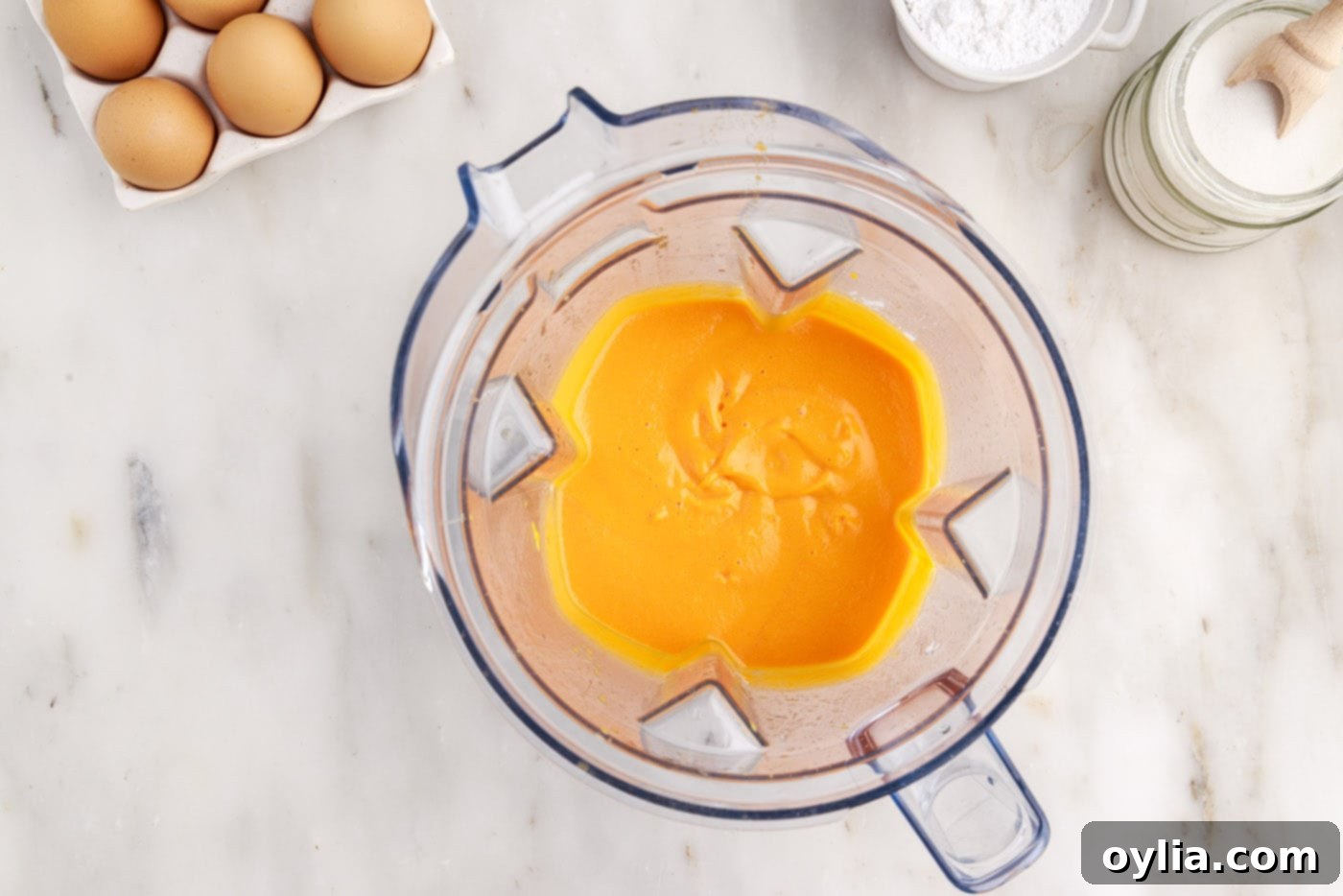 blitzed carrot mixture in a blender carafe