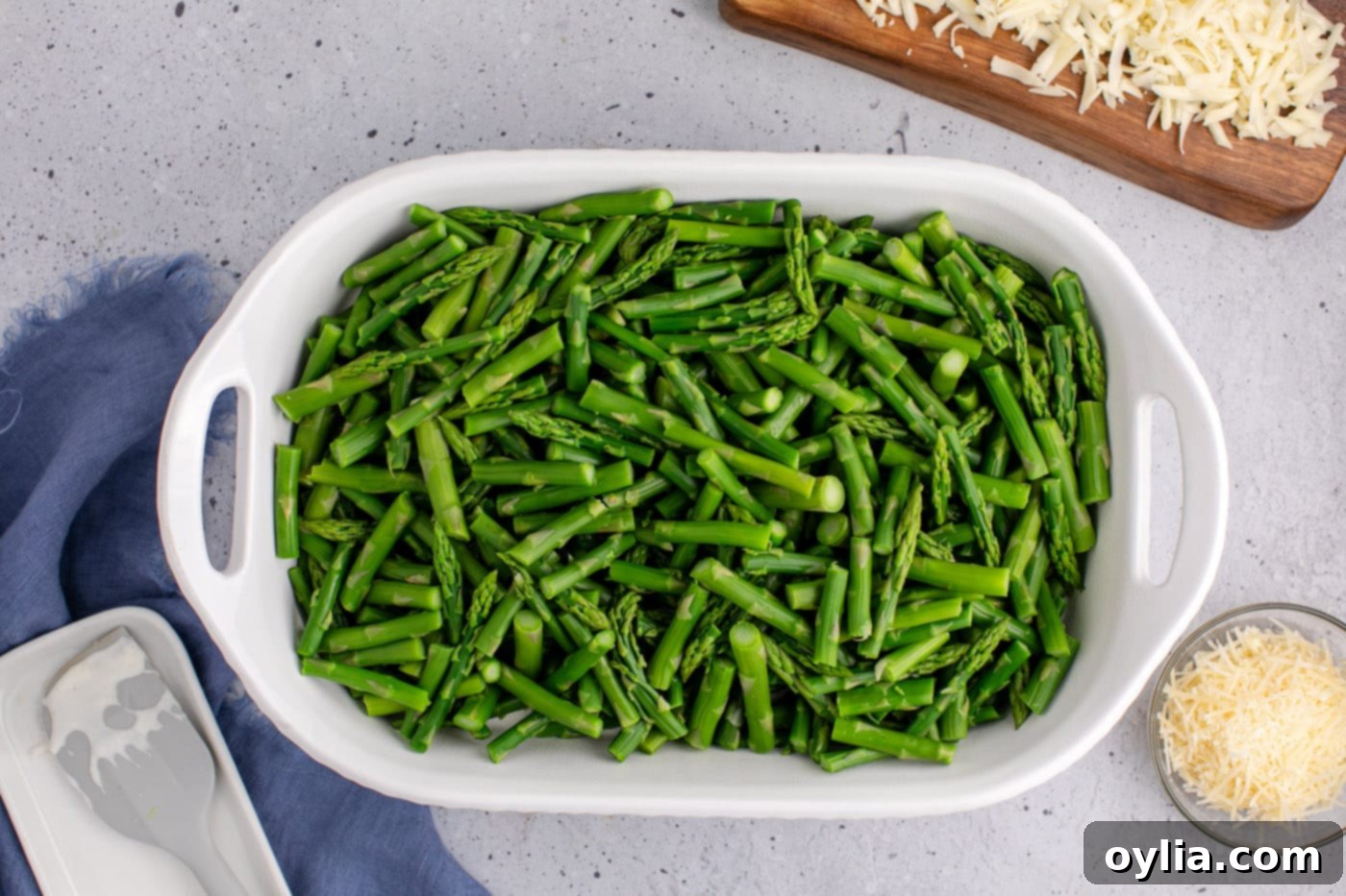 blanched asparagus in a casserole dish
