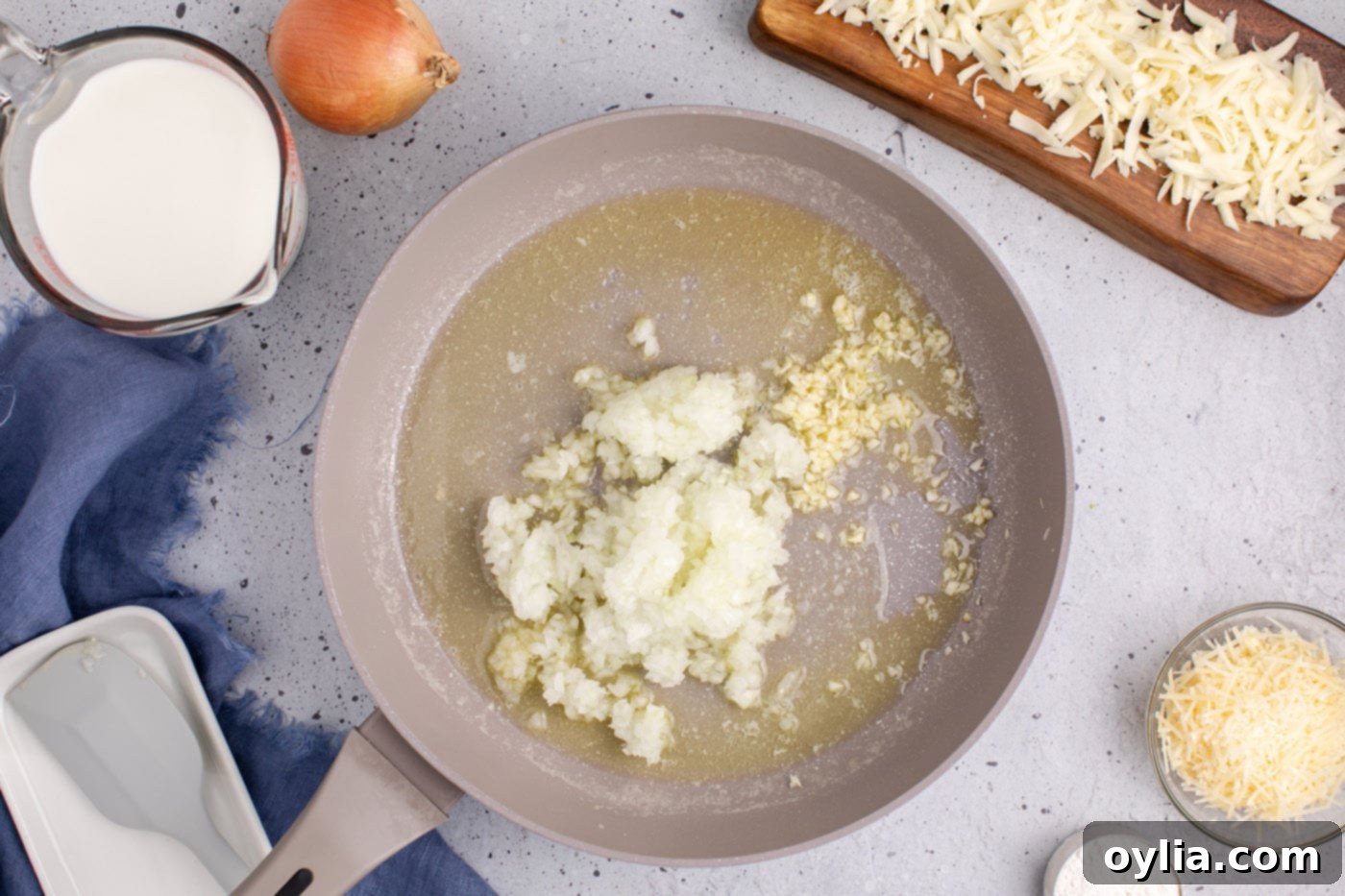onion and garlic in a saucepan with butter