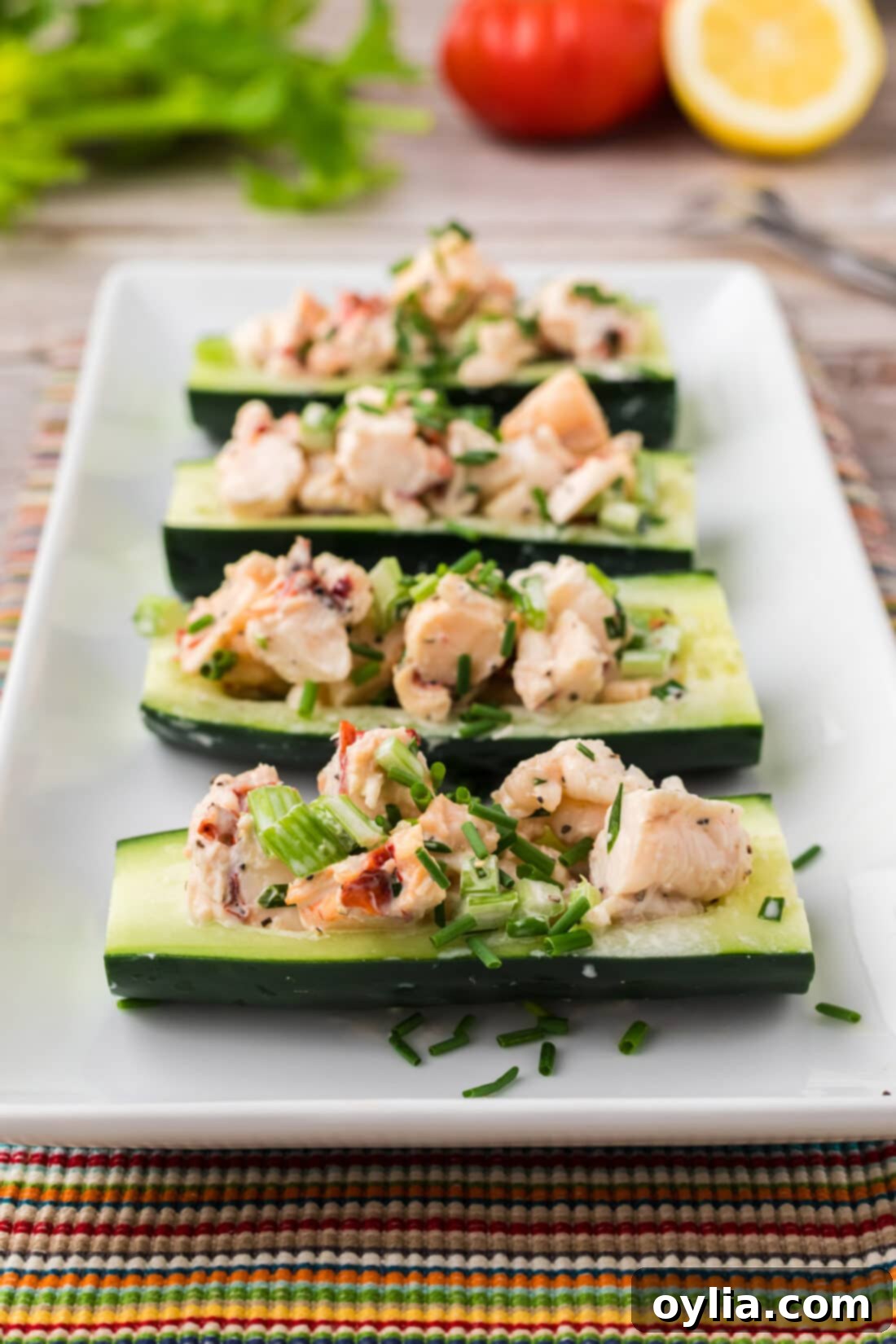 Four Lobster Cucumber Boats on a serving platter