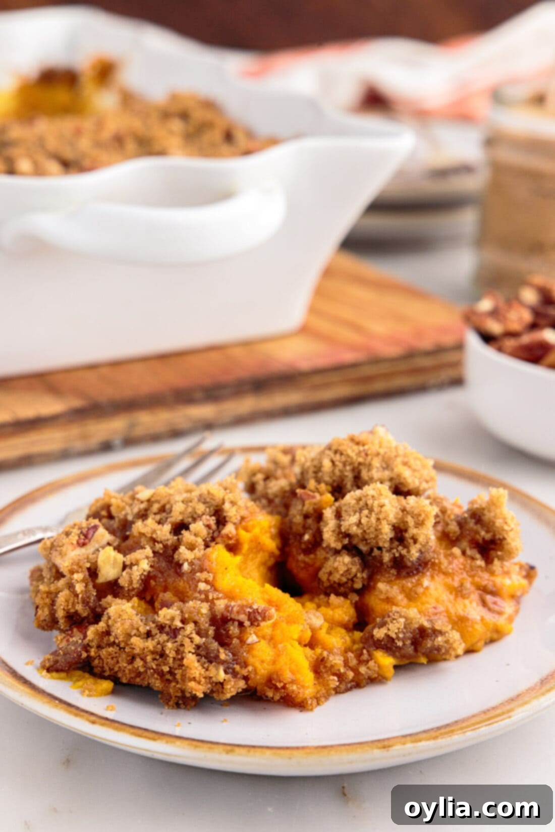 A perfectly portioned serving of Sweet Potato Souffle on a plate, ready to be enjoyed.