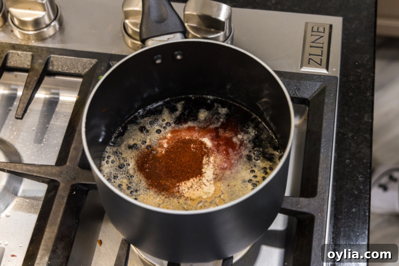 dr pepper sauce ingredients combined in a saucepan