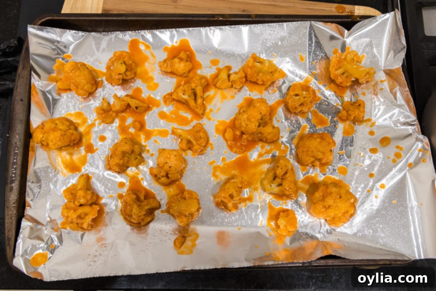 buffalo cauliflower on baking sheet