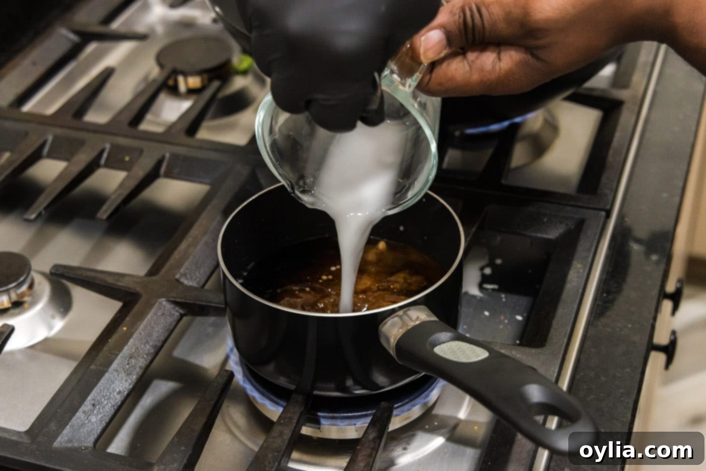 adding cornstarch slurry to kung pao sauce