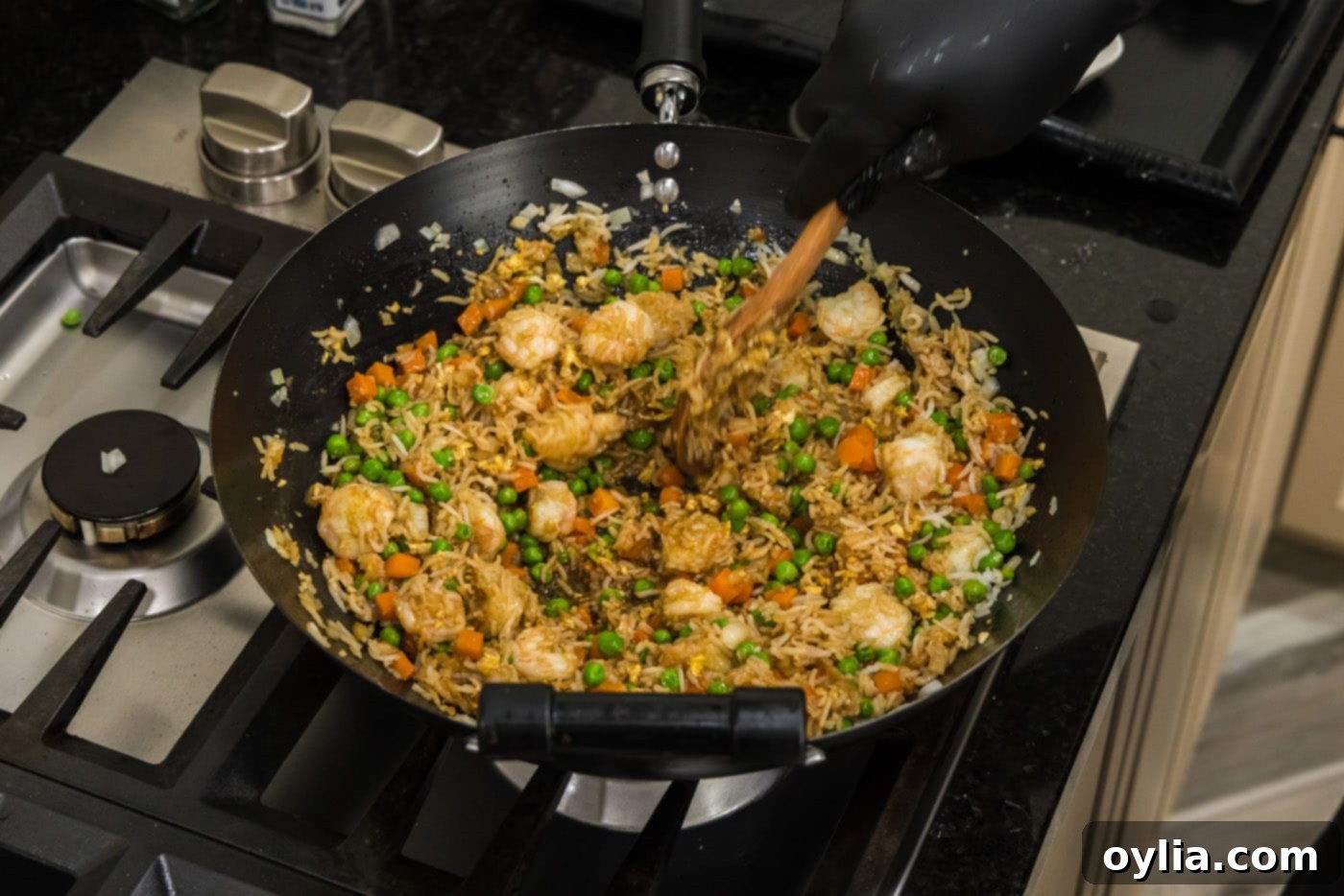 shrimp fried rice in a wok