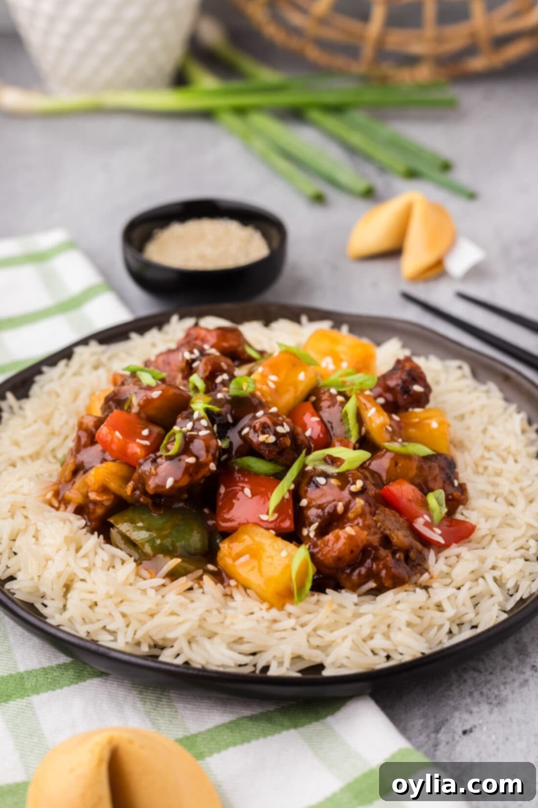 Crispy Sweet Sour Pork 18 A plate of Sweet and Sour Pork with fluffy white rice, ready to eat