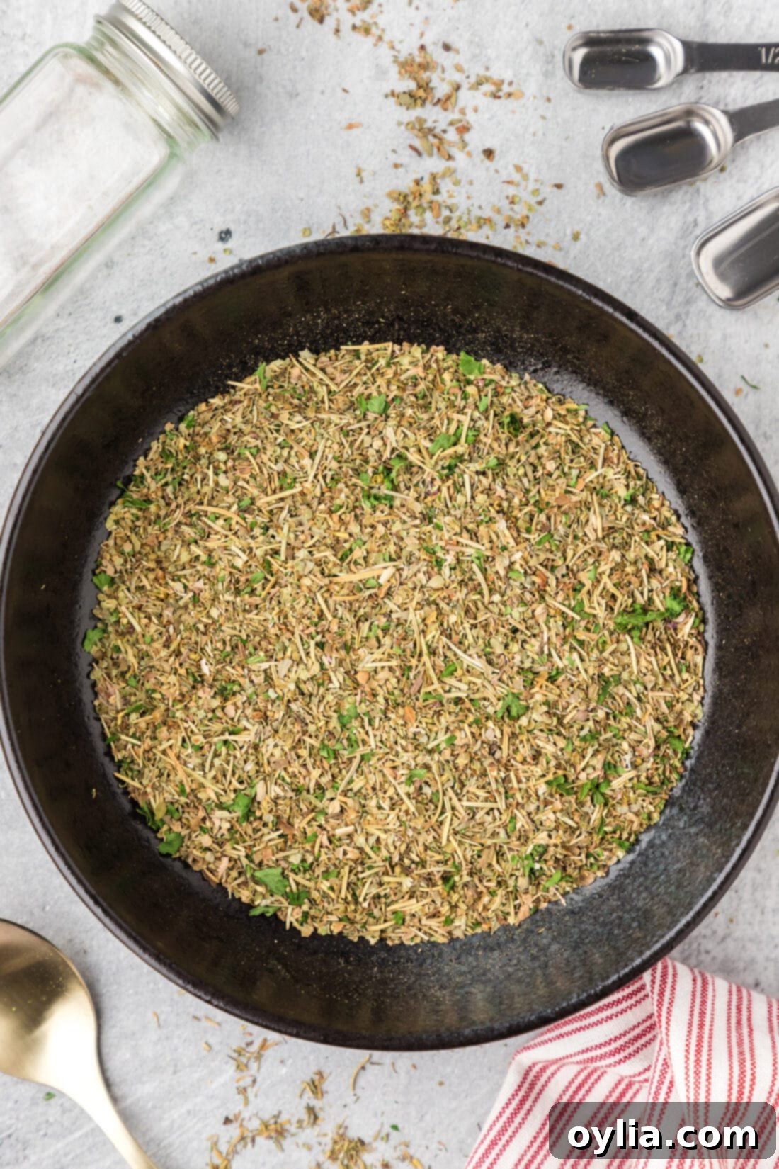 Classic Italian Herb Blend 2 A bowl filled with freshly mixed homemade Italian seasoning, ready for use in savory dishes.