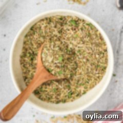 Classic Italian Herb Blend 8 Bowl of Italian Seasoning with a spoon in it