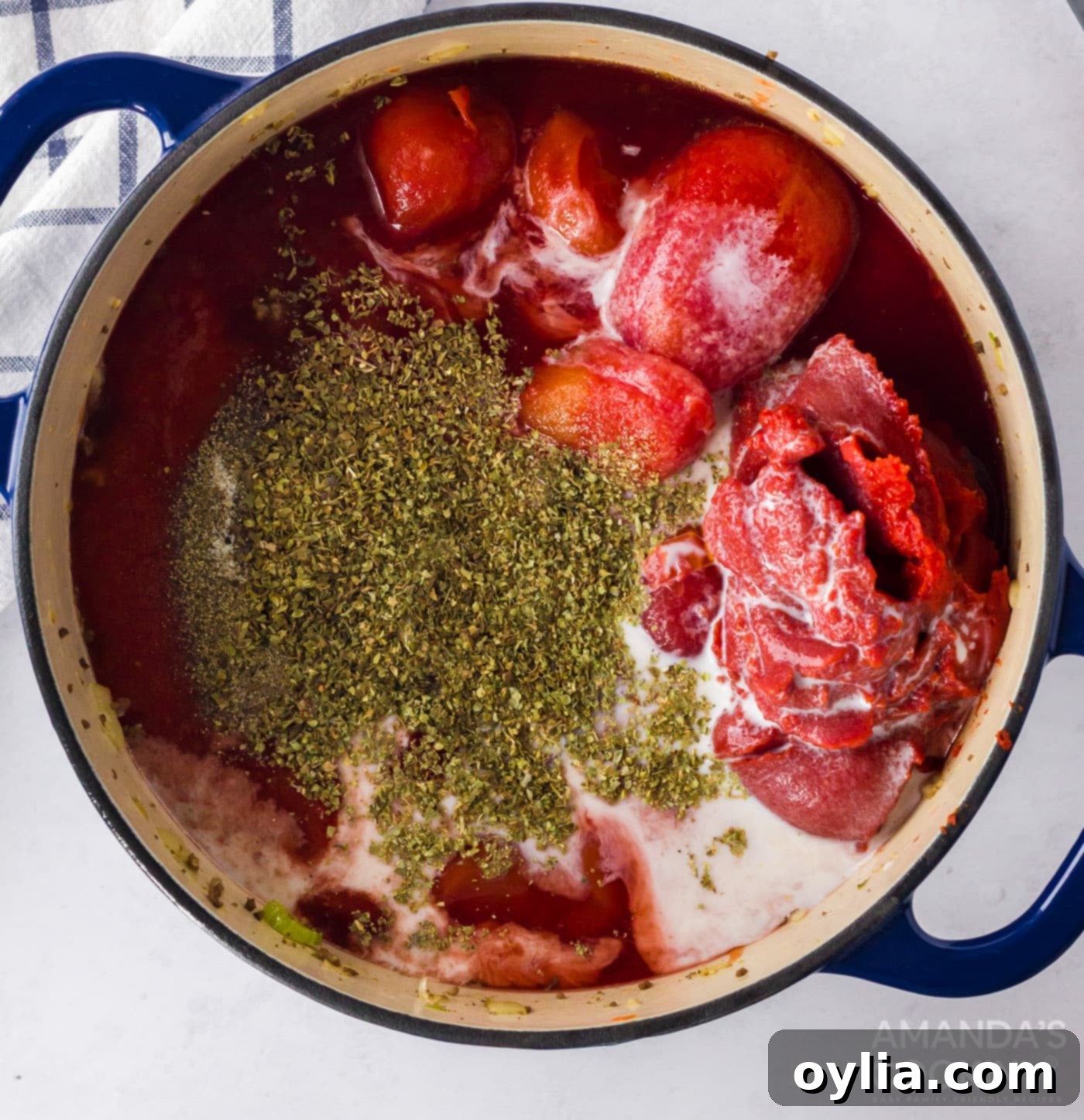 All ingredients for bolognese combined in a large pot before simmering