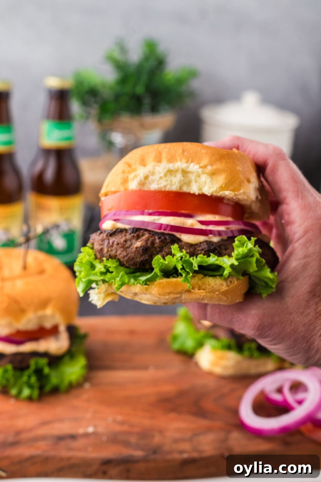Hand holding up a Buffalo Burger