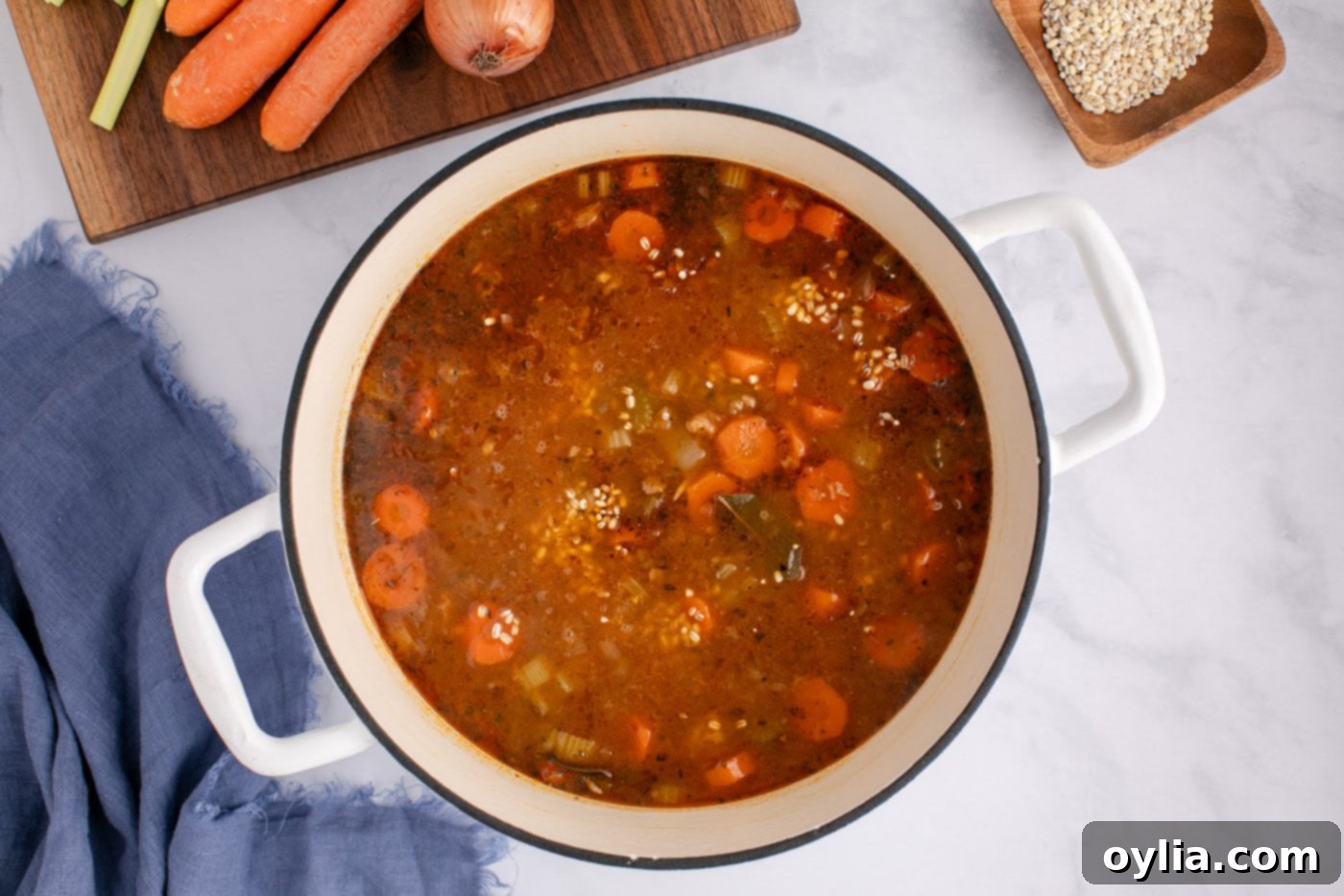beef barley soup cooking in a stock pot