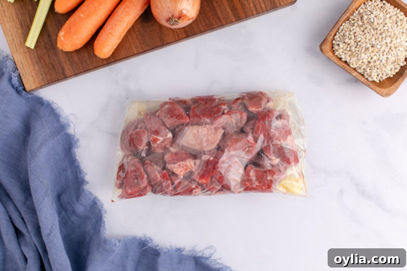 stew meat with flour and salt in bag