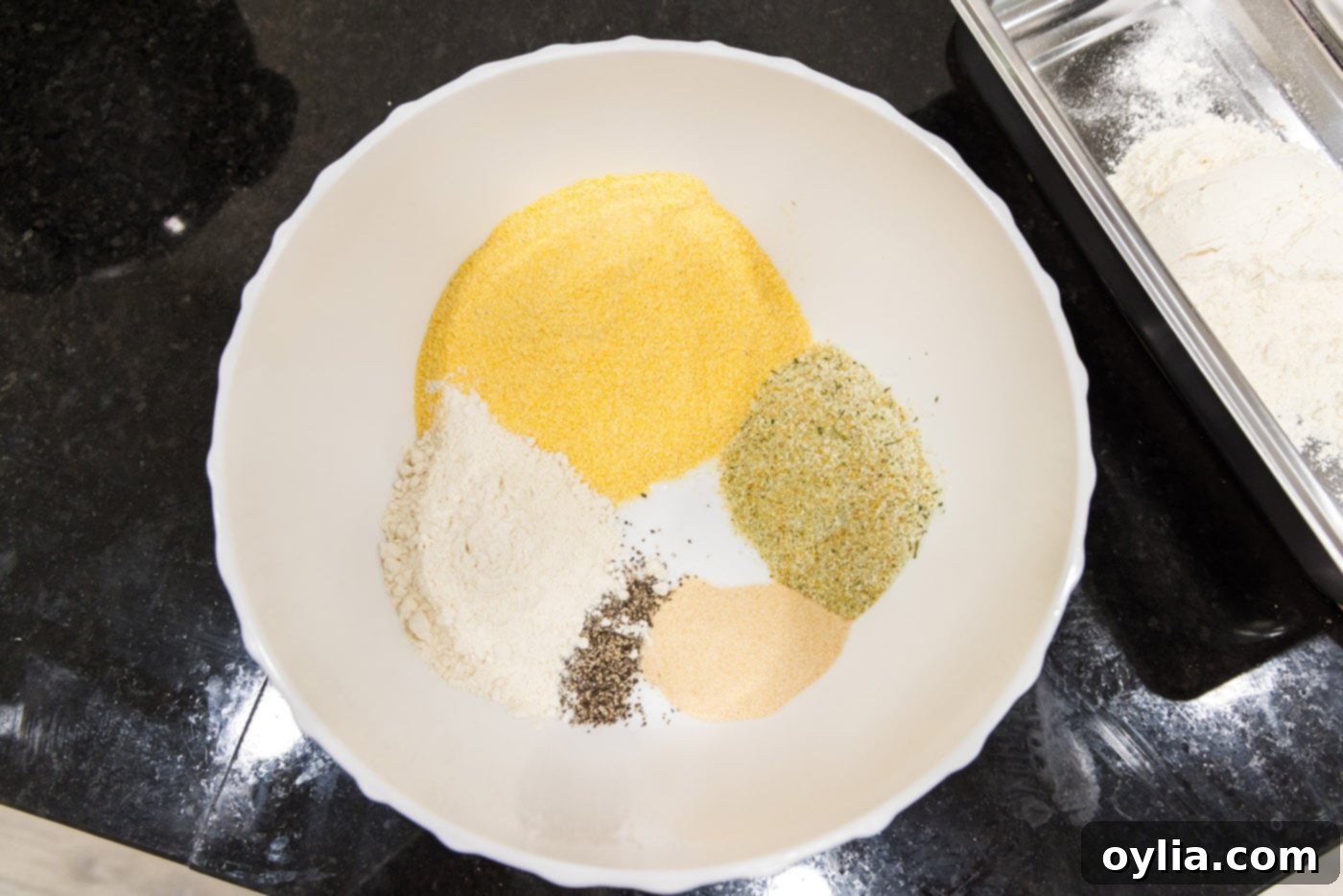 fried lamb chop ingredients in a bowl