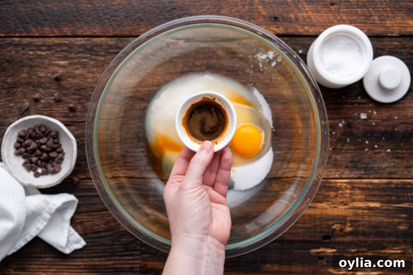 adding instant espresso to the egg and sugar mixture