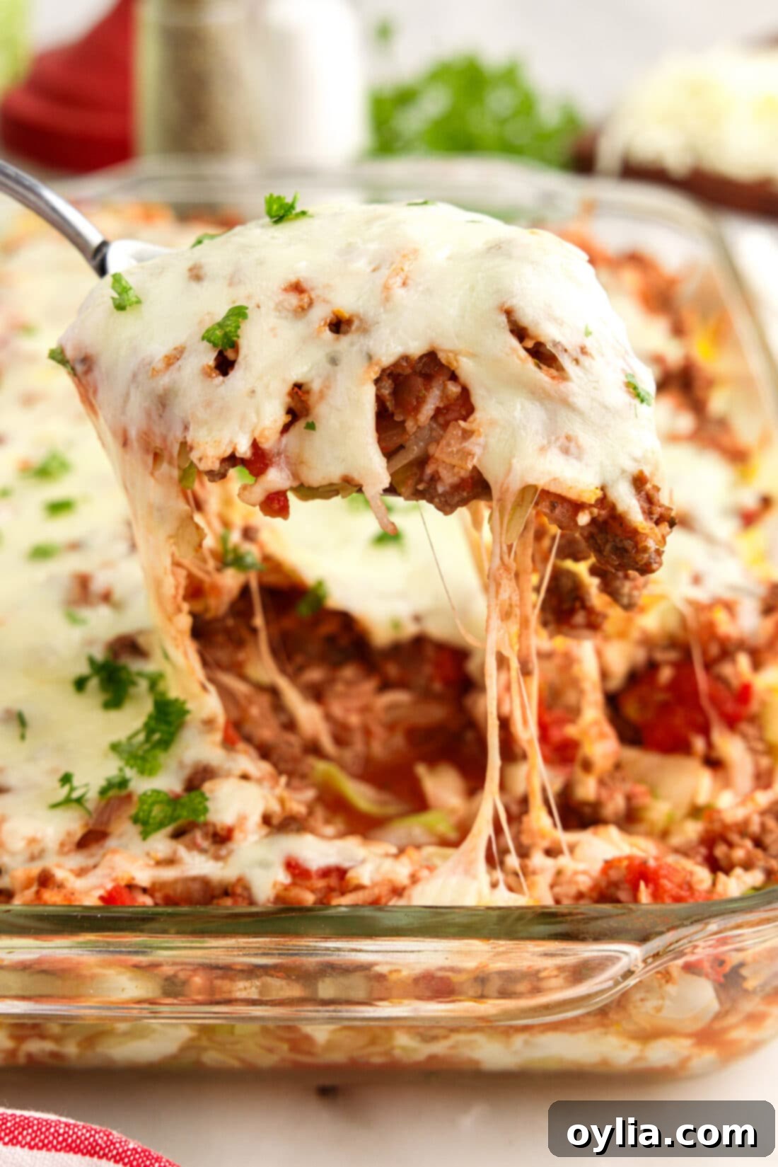 Scoop of Cabbage Roll Casserole being lifted out of the dish