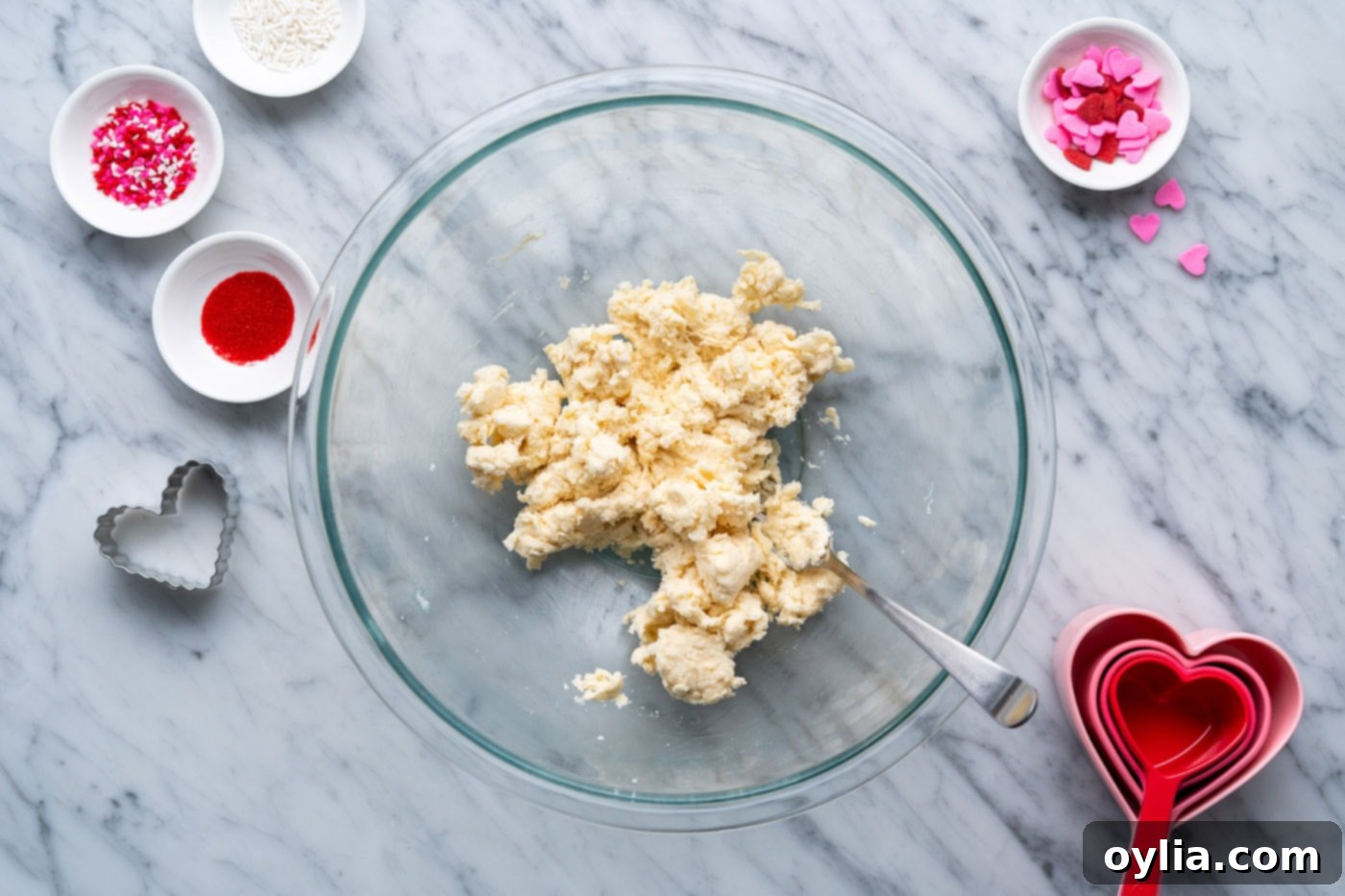cumbly pie dough in a bowl