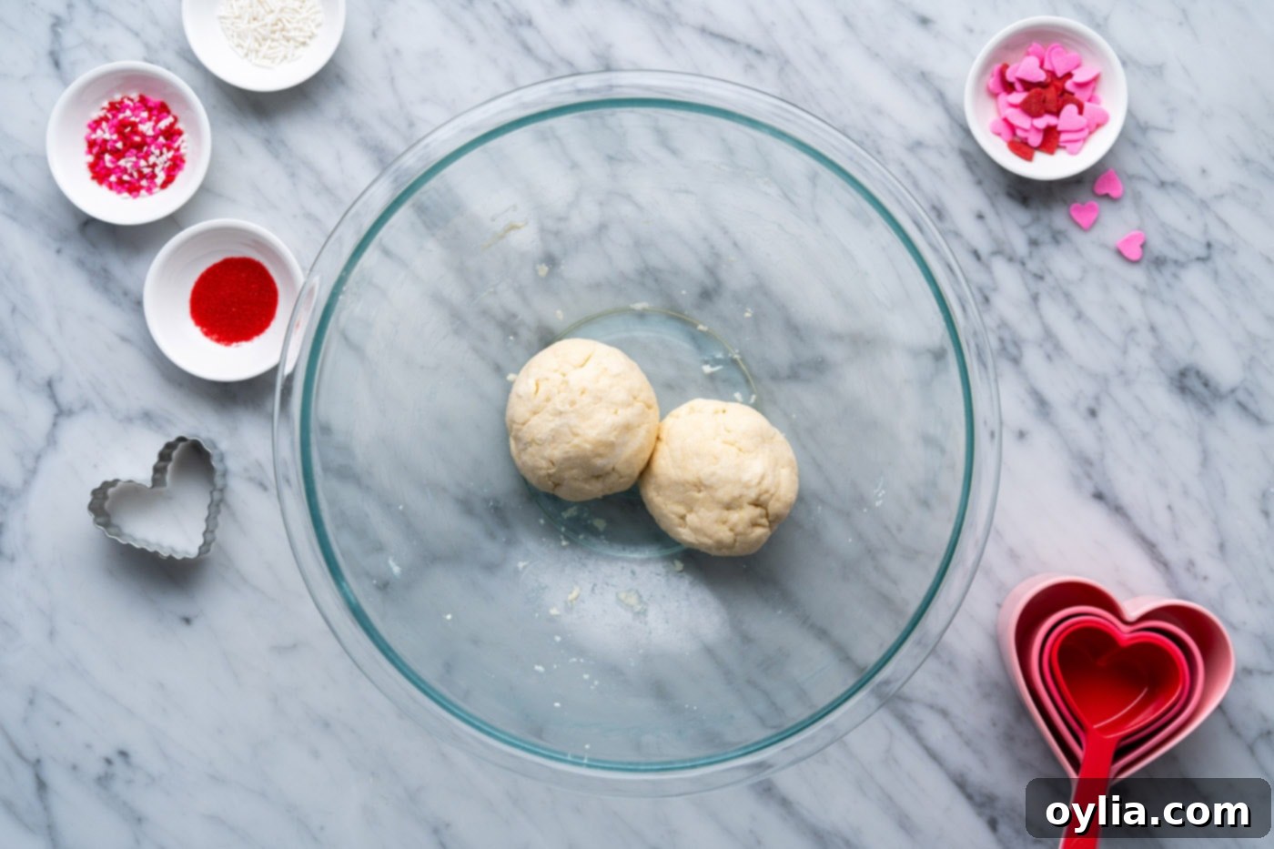 two pie dough balls in a bowl