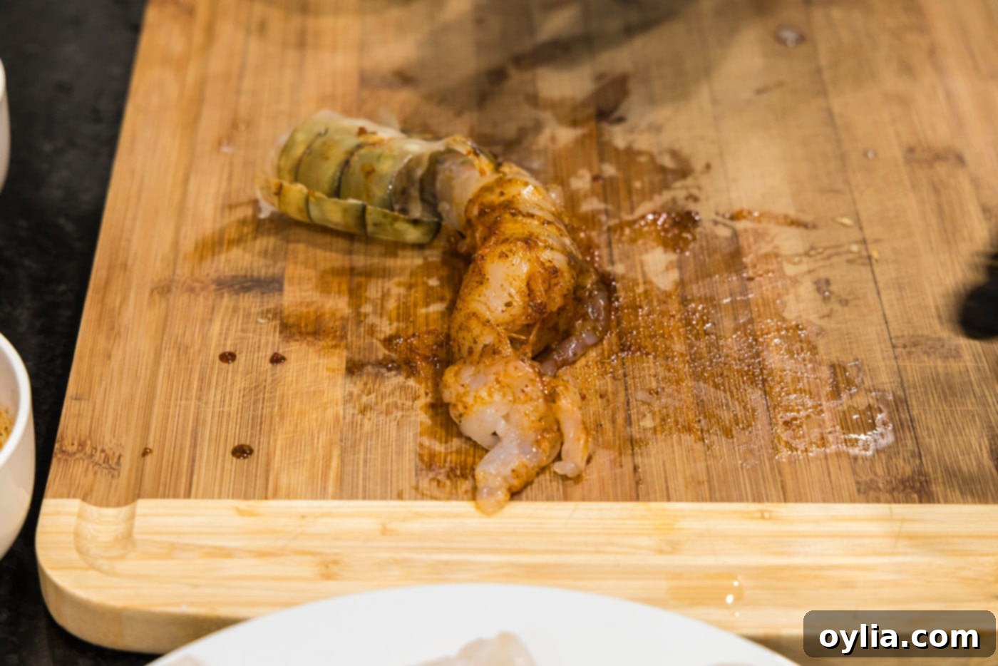 seasoned colossal shrimp on cutting board