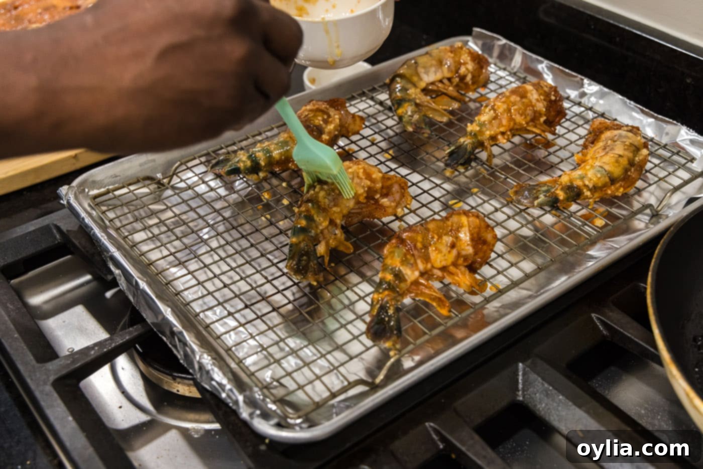 basting colossal shrimp with garlic butter