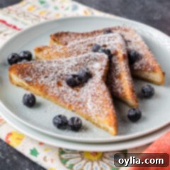 Three slices of Air Fryer French Toast on a plate