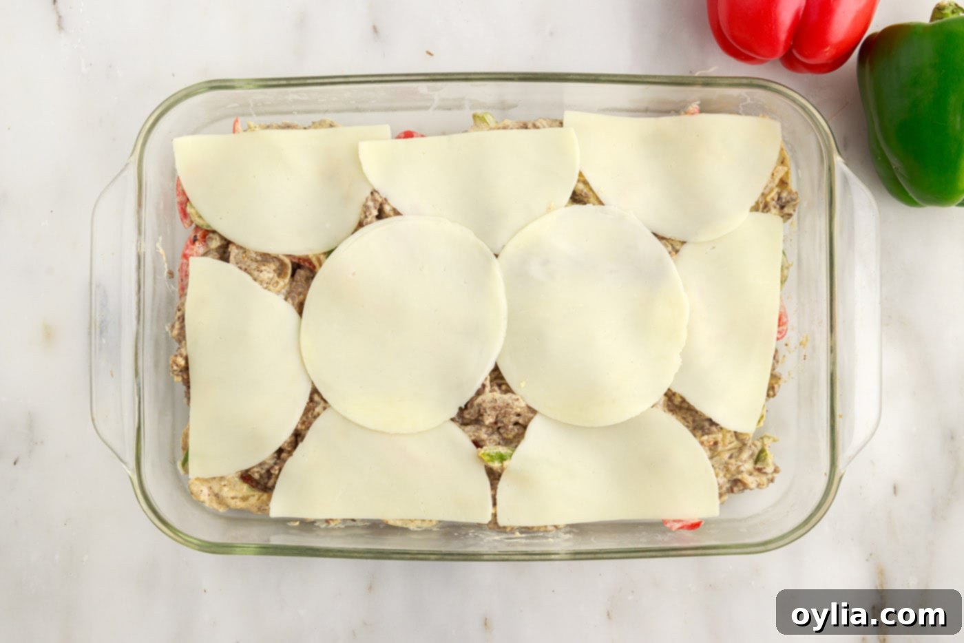 provolone cheese on top of Philly Cheesesteak Casserole