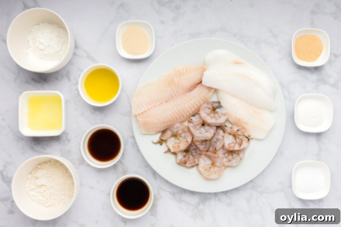 Ingredients for Korean Fish Cakes arranged on a white surface